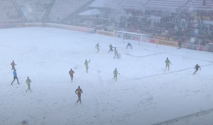 An action shot taken during Real Salt Lake's 3-0 win over LAFC in Major League Soccer on a snow-covered pitch in March 2024